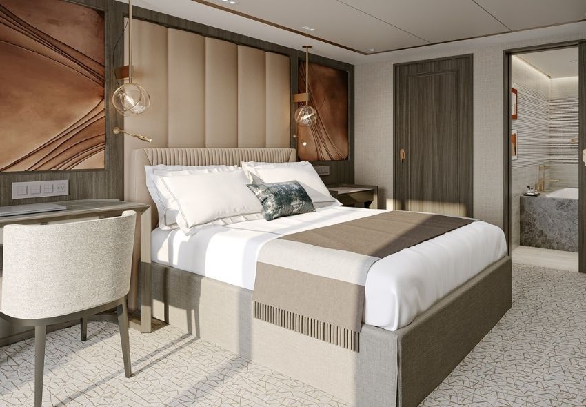 Visualisierung des Schlafbereichs der Skyview Regent Suite auf der Seven Seas Prestige mit maßgefertigtem Bettkonzept, hochwertiger Ausstattung und offen gestaltetem Wohnbereich.