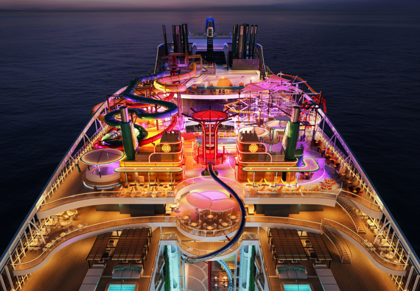 The Spiral und The Harbour auf der MSC World Asia Die Aufnahme zeigt den Außenbereich „The Harbour“ auf der MSC World Asia bei Dunkelheit. Zahlreiche farbenfrohe Lichtinstallationen in Pink, Rot, Blau und Violett beleuchten den Freizeitbereich auf dem Oberdeck des Schiffes. Im Mittelpunkt verläuft